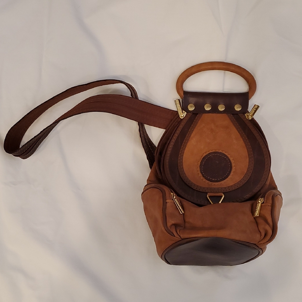 Brown Leather Backpack with Gold Accents